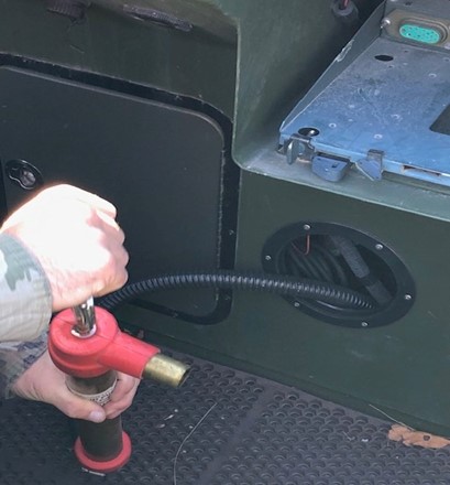 Use the hand-operated pump, NSN 4320-00-984-0259, to rid water from the hull